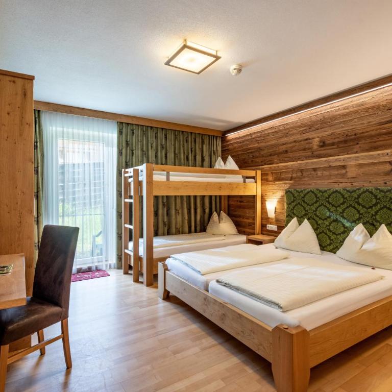 Hotel Apart Garni Heisenhof - Familienzimmer mit Terrasse - 2