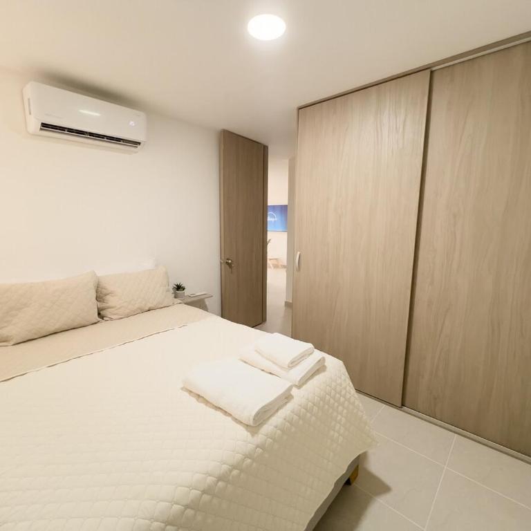 2 cuartos AC y piscina - Two-Bedroom Apartment - 12