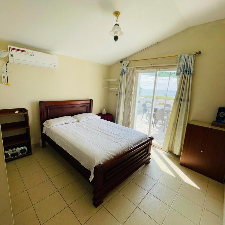 Villa Serena para familias y amigos - vista al mar - Four-Bedroom House - 15