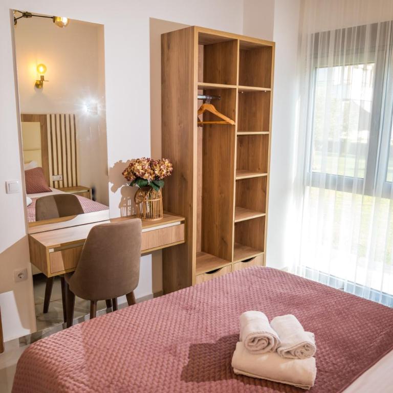 Robi Apartments - One-Bedroom Apartment with Garden View - 2