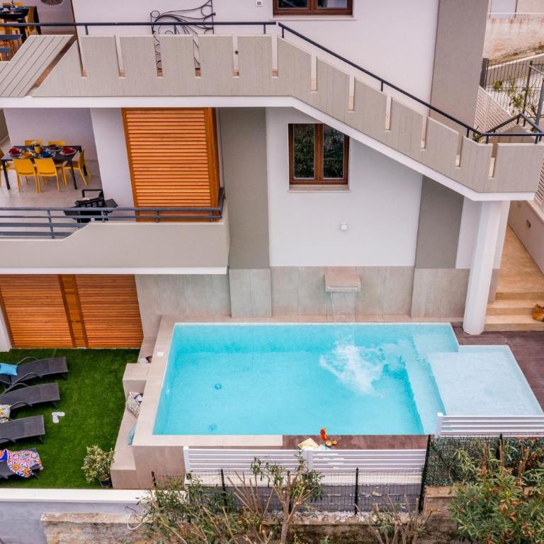 Appartamenti in Villa Syrenis vista mare con piscina riscaldata e campo da bocce - Appartamento Deluxe con 3 Camere da Letto - 6