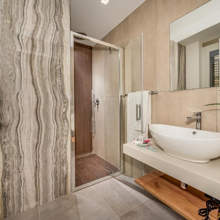 Appartamenti in Villa Syrenis vista mare con piscina riscaldata e campo da bocce - Appartamento Deluxe con 3 Camere da Letto - 25