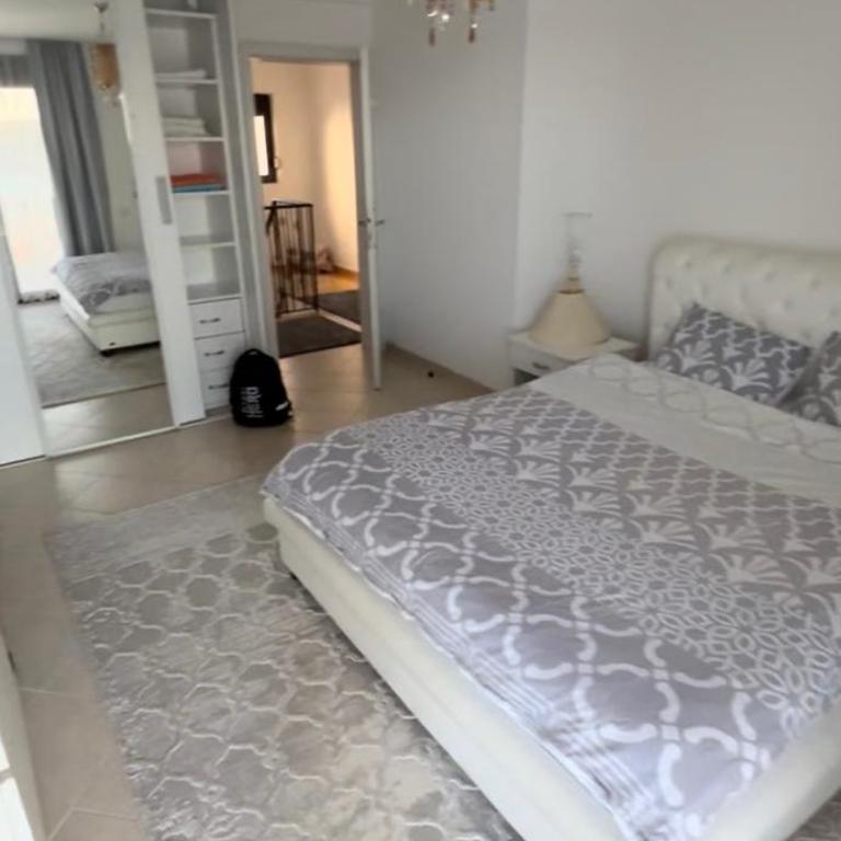 View 1 - Three-Bedroom Premium Apartment with Balcony - 5