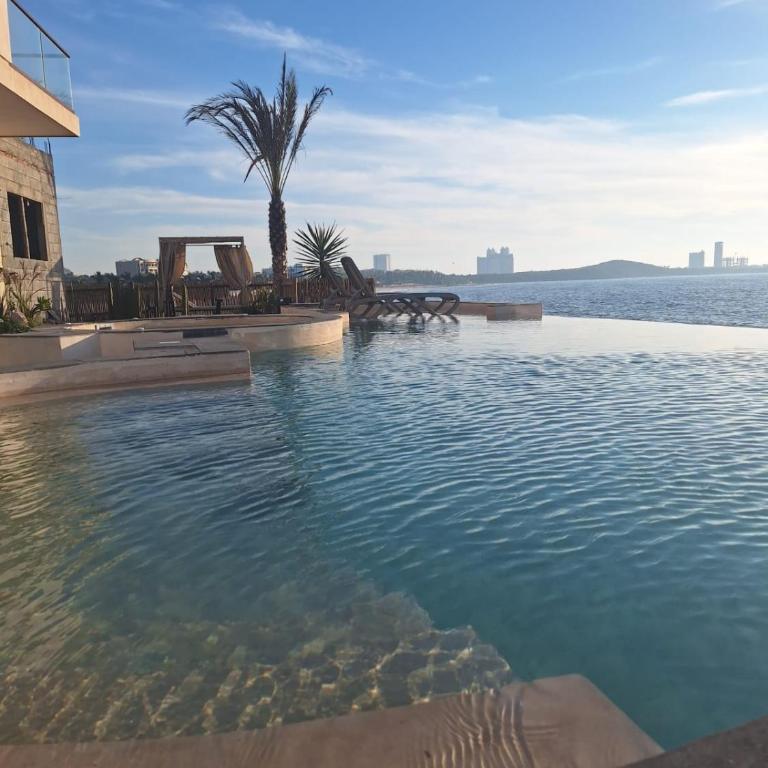 New beachfront apartment! - Two-Bedroom Apartment - 36