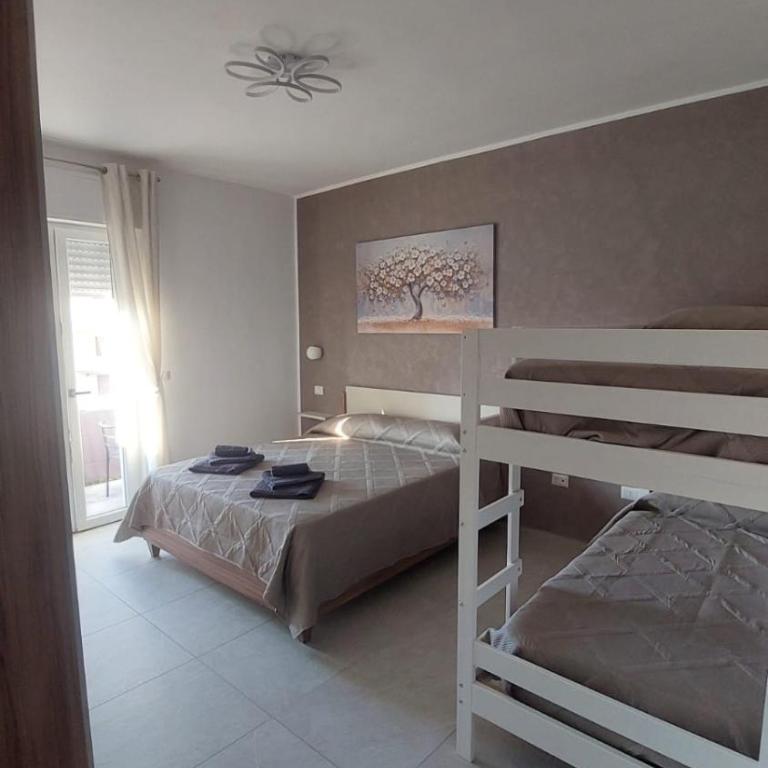 La Pilozza Guest Rooms - Camera Quadrupla con Vista Mare - 8