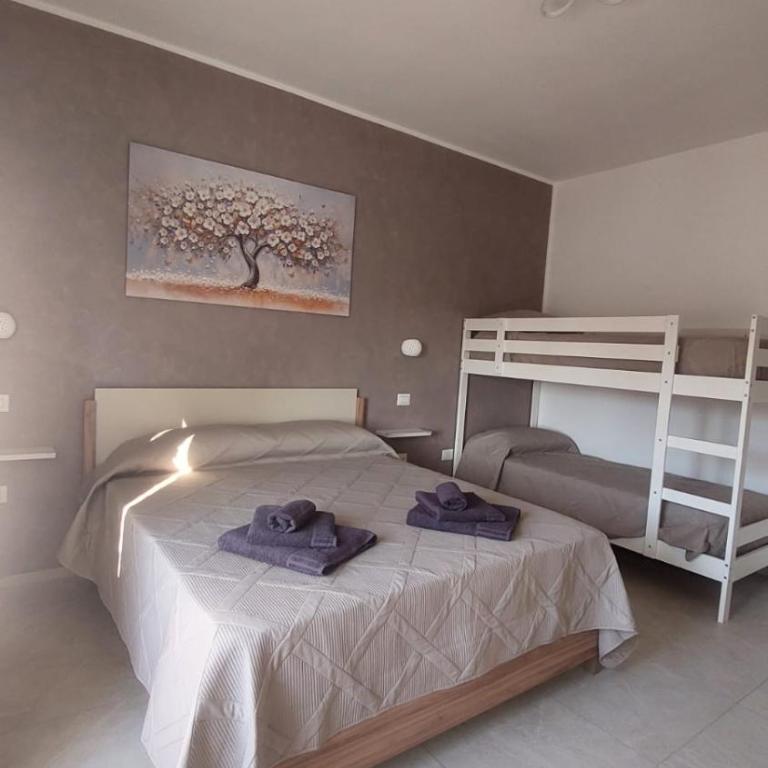 La Pilozza Guest Rooms - Camera Quadrupla con Vista Mare - 9