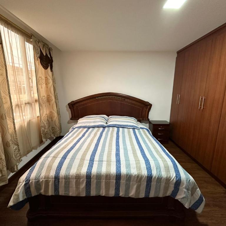Instant Hotel - Departamento en Ambato - Habitación Doble Deluxe - 2 camas dobles - 16