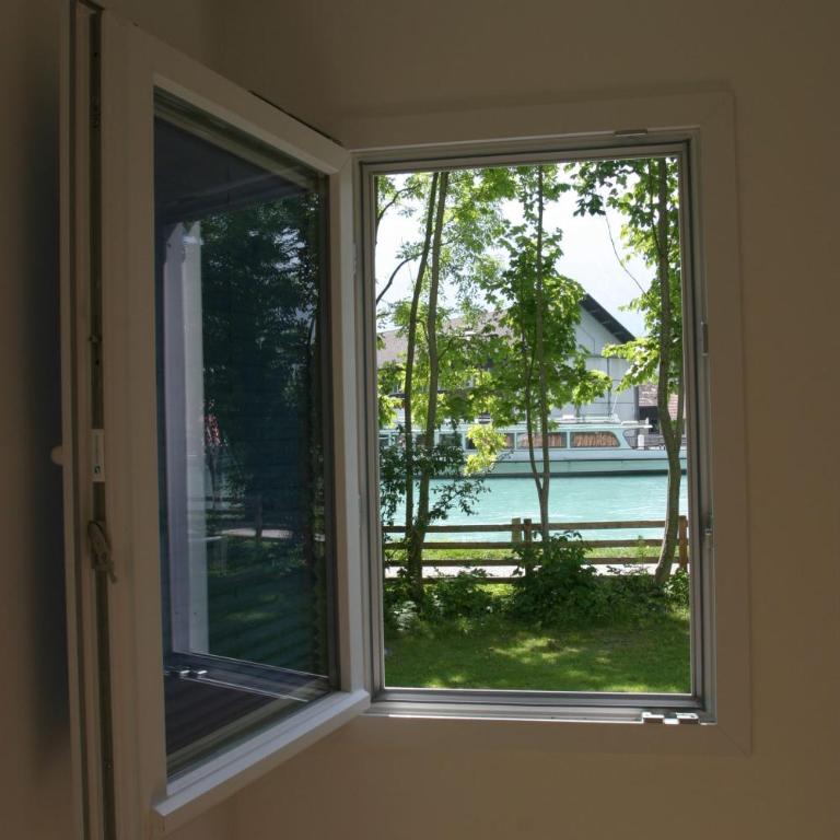 RiverLodge TCS Training & Freizeit AG - Familienzimmer mit Seeblick - 5