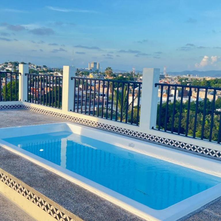 Las Hadas: City Condo with Pool - Two-Bedroom Apartment - 29