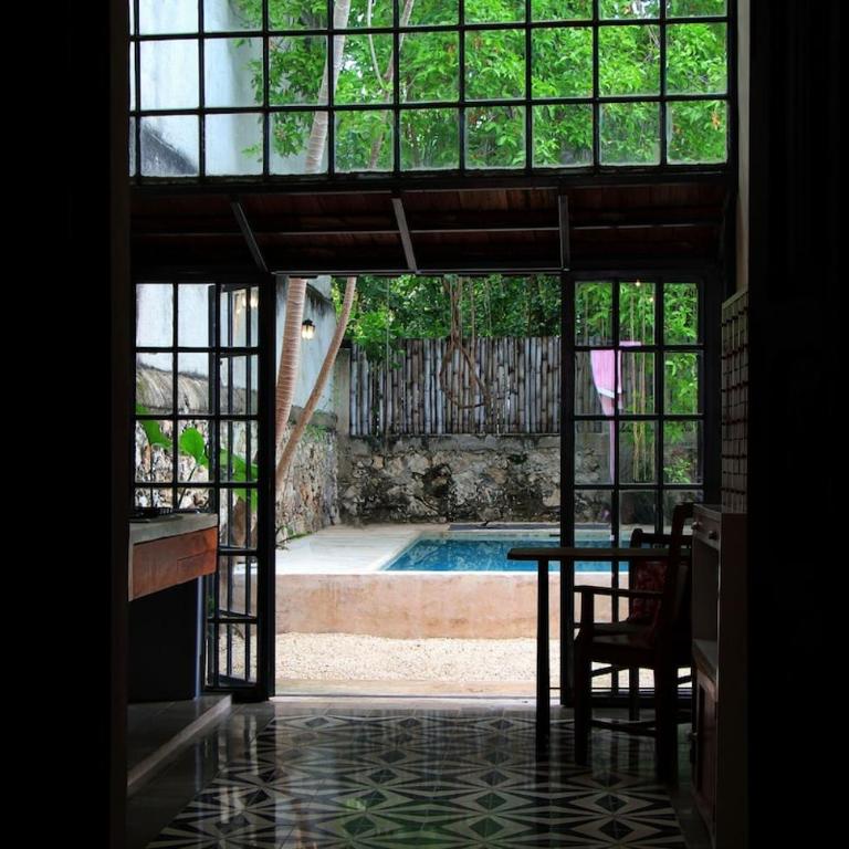 Oasis with natural pool in the heart of Mérida - Three-Bedroom Villa - 24