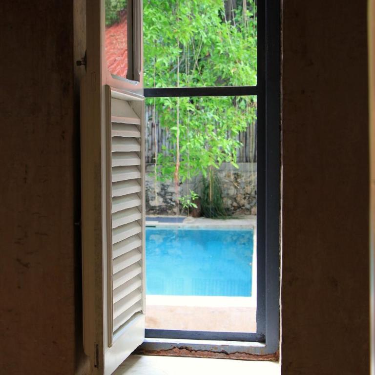 Oasis with natural pool in the heart of Mérida - Three-Bedroom Villa - 83