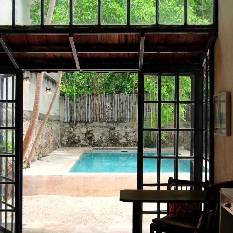 Oasis with natural pool in the heart of Mérida - Three-Bedroom Villa - 48