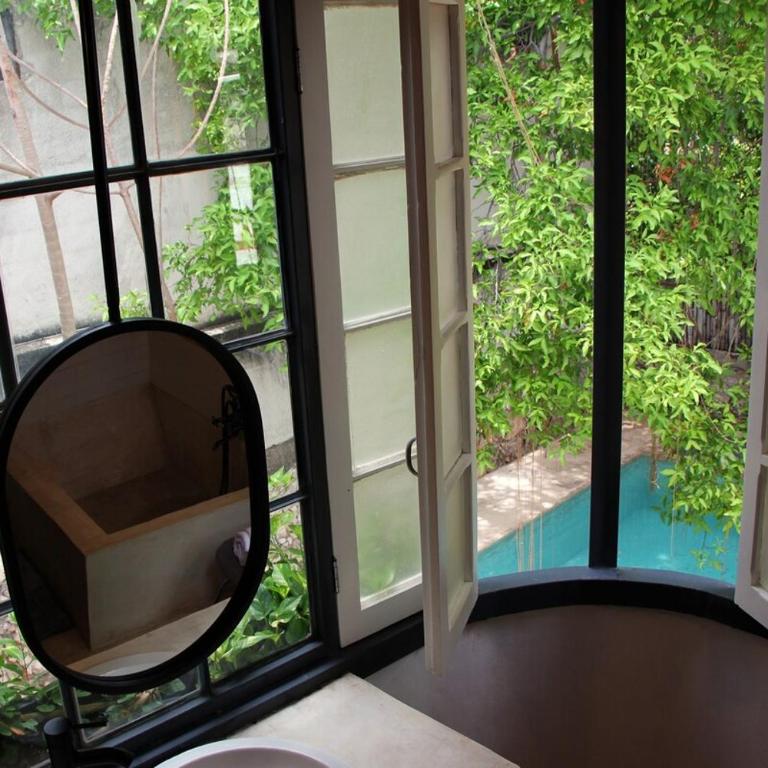 Oasis with natural pool in the heart of Mérida - Three-Bedroom Villa - 55