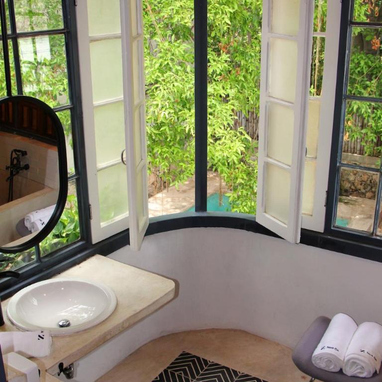 Oasis with natural pool in the heart of Mérida - Three-Bedroom Villa - 88
