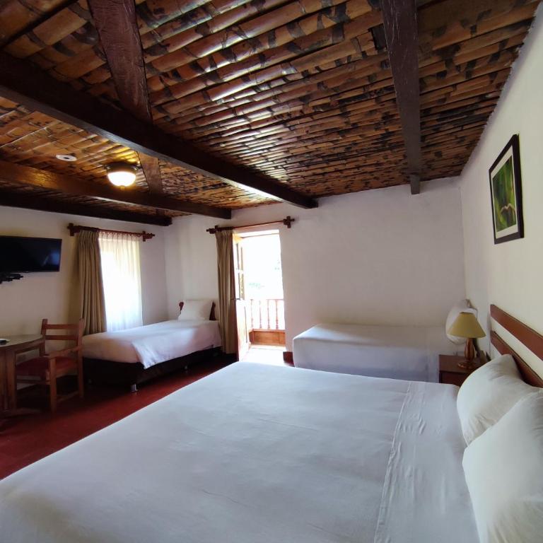 Hotel Fundo Achamaqui - Comfort Quadruple Room - 1