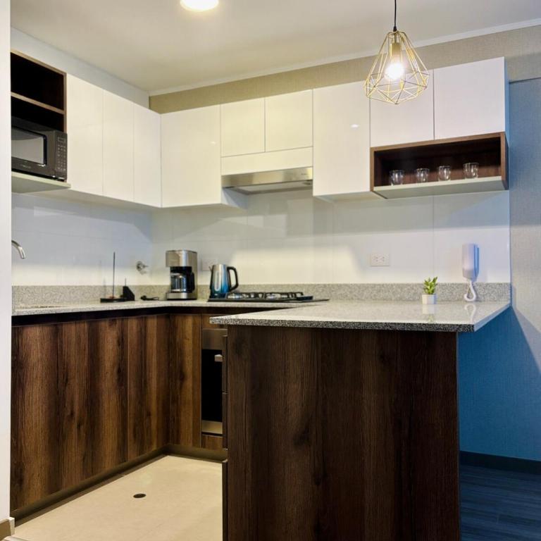 Modern and centrally located with a rooftop - One-Bedroom Apartment - 9