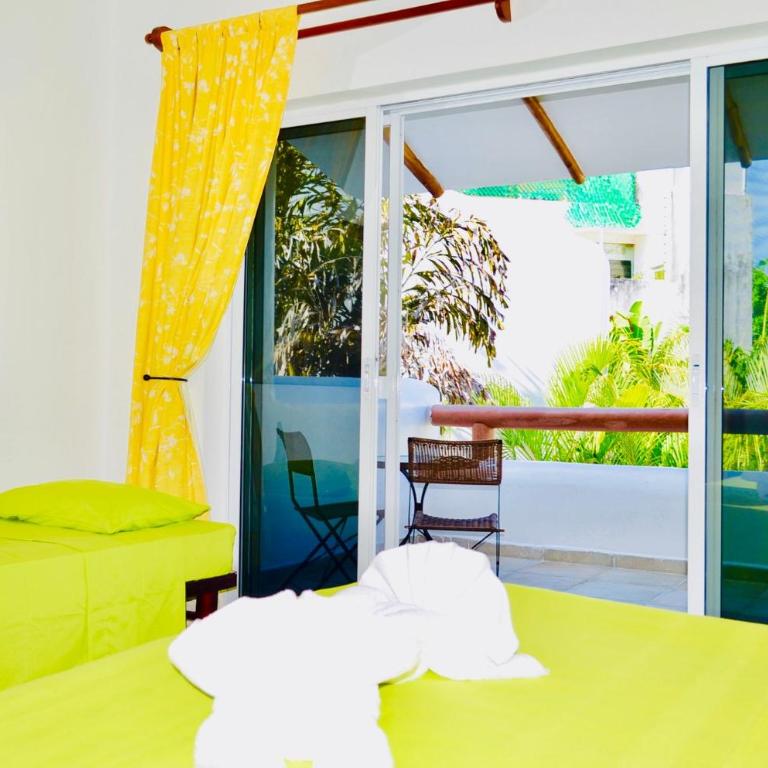Deluxe Balcony Room With Swimming Pool Air Conditioning and Parking - Deluxe Quadruple Room - 10