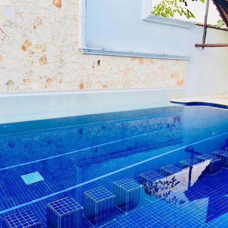 Deluxe Balcony Room With Swimming Pool Air Conditioning and Parking - Comfort Quadruple Room - 17