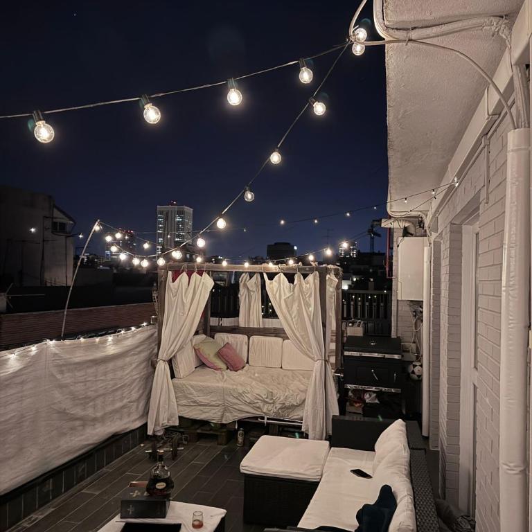Rooftop Bernabeu Retreat - Two-Bedroom Apartment with Balcony and Terrace - 1