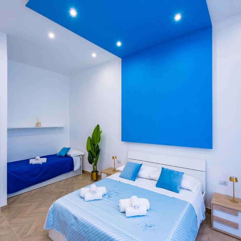 Essentia Home - Camera Familiare con Bagno Privato - 2