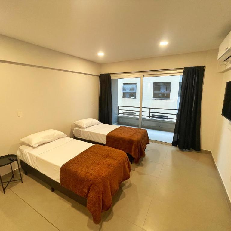 Studio luminoso y nuevo, a pasos de la calle principal - One-Bedroom Apartment - 8