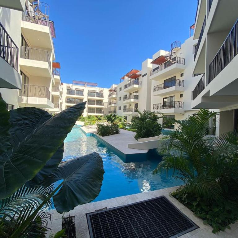 Luxe Jungle Retreat with Private Terrace & Jacuzzi in Aldea Zama - Two-Bedroom Deluxe Apartment - 1