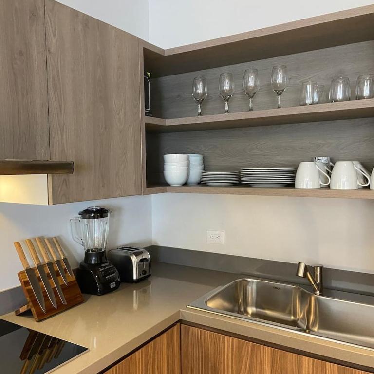 Luxe Jungle Retreat with Private Terrace & Jacuzzi in Aldea Zama - Two-Bedroom Deluxe Apartment - 12
