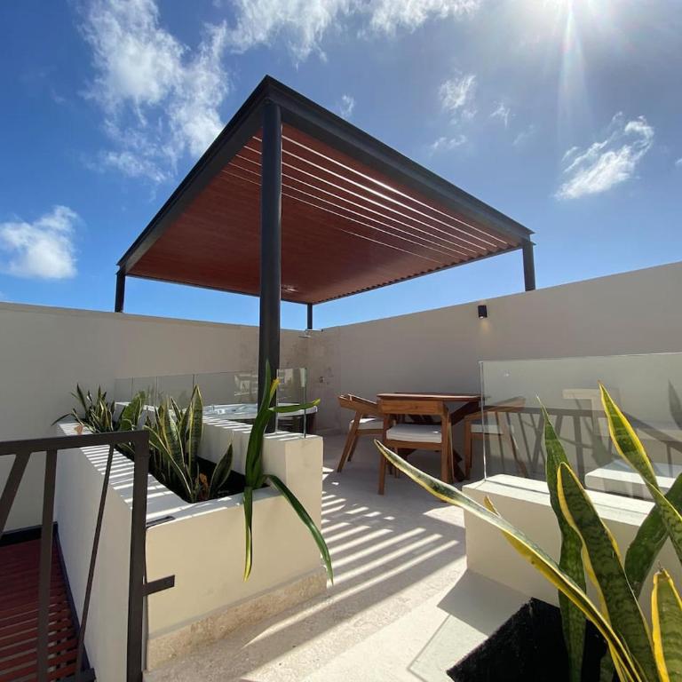 Luxe Jungle Retreat with Private Terrace & Jacuzzi in Aldea Zama - Two-Bedroom Deluxe Apartment - 25