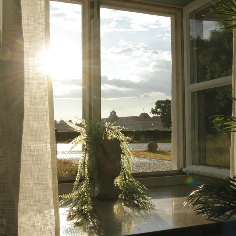 Vis-à-Vis Schloss Nymphenburg - Rondellapartments - Zweibettzimmer mit Blick - 11