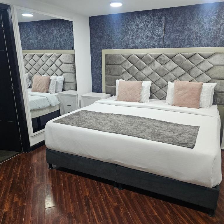 Aw Hotel Quality Comfort Embajada - Corferias - Habitación Triple Deluxe - 1