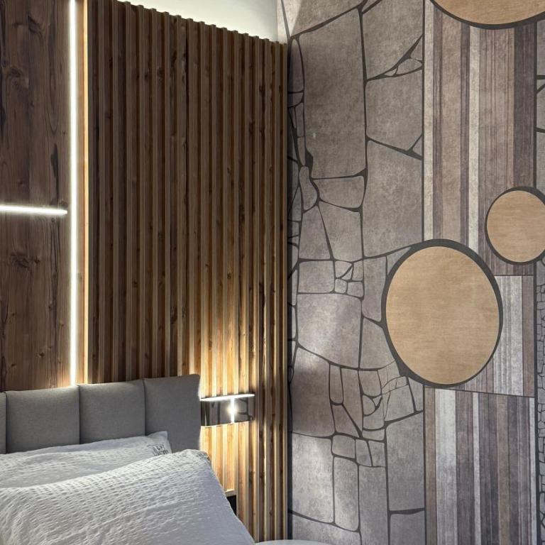 A&F LUXURY Rooms Pinzolo - Habitación Deluxe con cama extragrande - 1