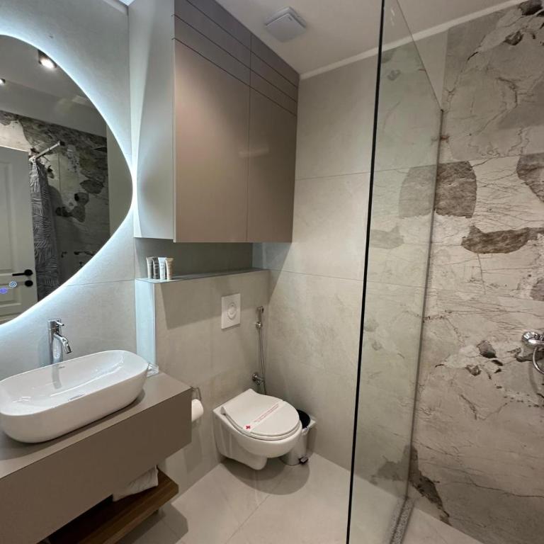 Four Elements Apartments - Deluxe Apartment - 15
