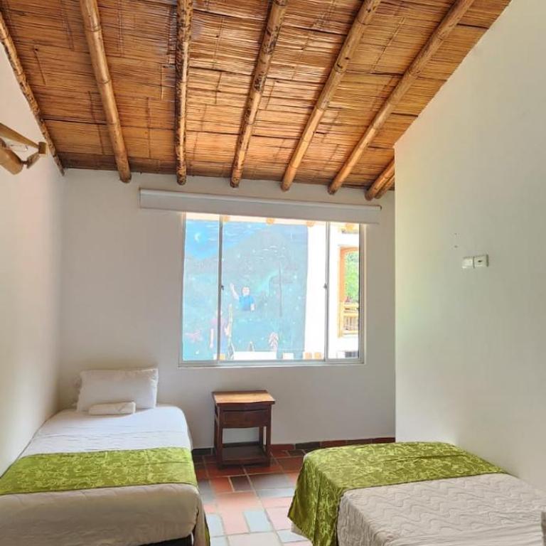 Hotel y termales Las Heliconias - Standard Quadruple Room - 1