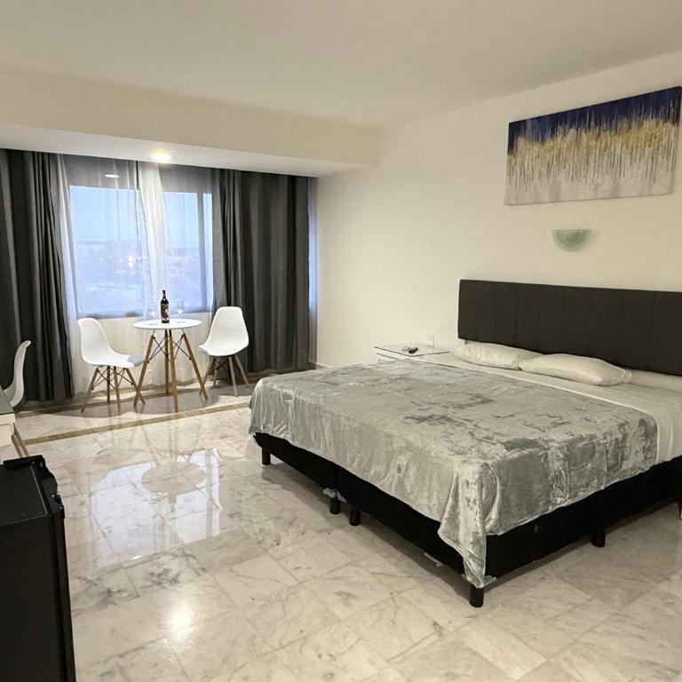 Condo in Ocean Front Resort - Suite Superior con cama extragrande - 1