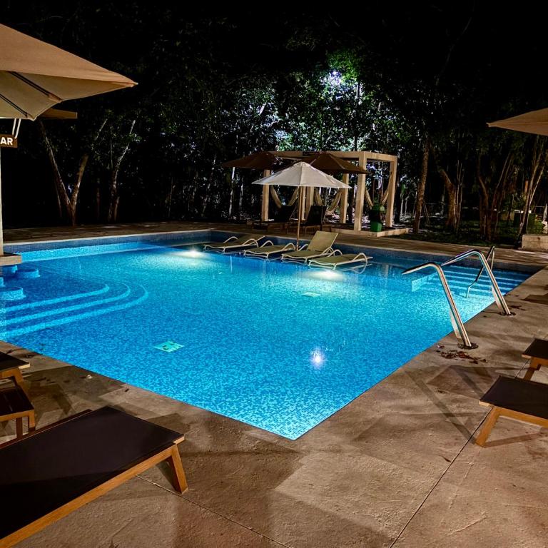 CasaMEXH Selva II- Vacaciones de ensueño cerca de playas-arrecifes-cenotes y naturaleza Amenidades tipo resort - Two-Bedroom Apartment with Balcony - 5