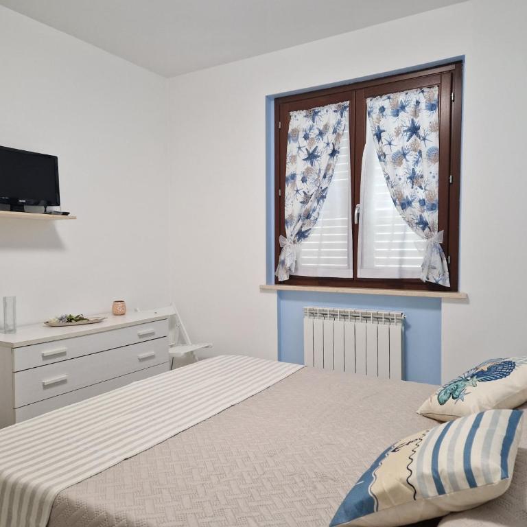 Villino a schiera con ingresso indipendente con balcone e piccola corte esterna con doccia a due passi dal mare - Appartamento con 2 Camere da Letto - 15
