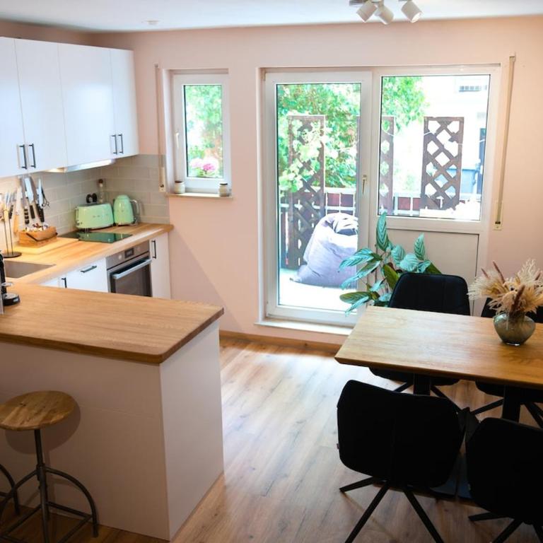 Stadt-Refugium mit Terrasse - Apartment mit 1 Schlafzimmer - 1