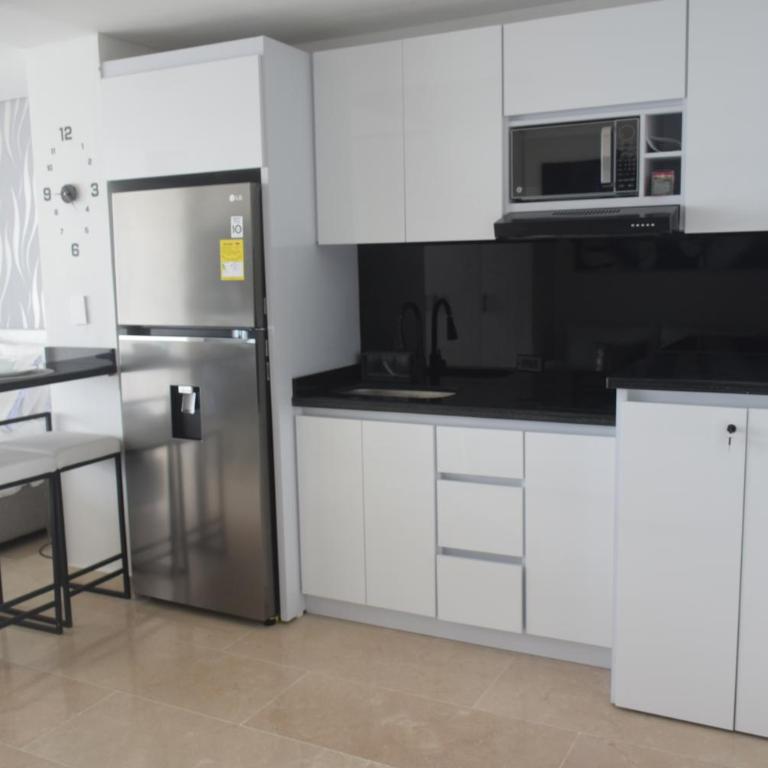 Apartasuite cerca Aeropuerto - Apartamento de 1 dormitorio - 28