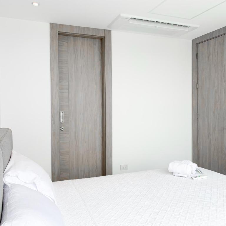 Suites de lujo cerca del WORLD TRADE CENTER, Parking Gratis, GYM, PISCINA - One-Bedroom Apartment with City View - 6