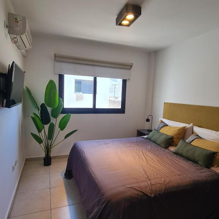 MAGNUS, 2 baños, 2 hab, TODO NUEVO! en el corazón de Carlos Paz - Apartamento de 1 dormitorio - 22