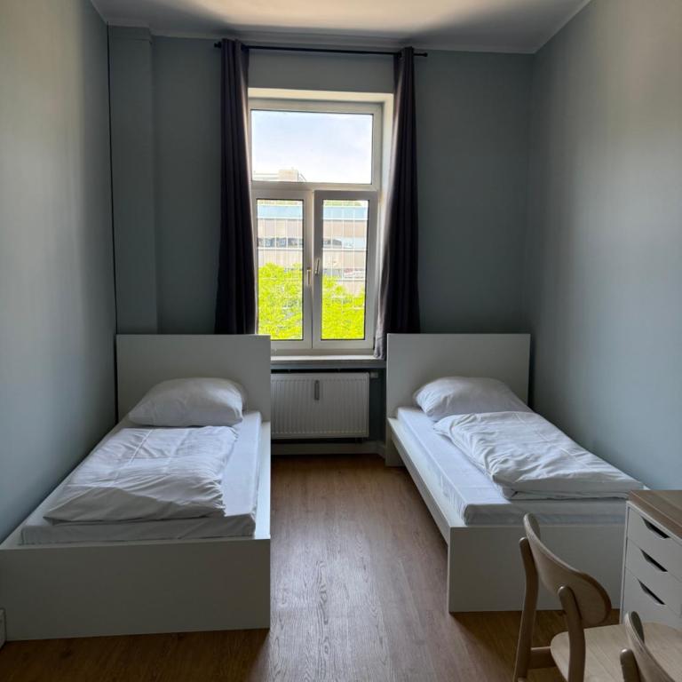 1, 2, sleep Boardinghouse München Hauptbahnhof - Zweibettzimmer mit Gemeinschaftsbad - 4