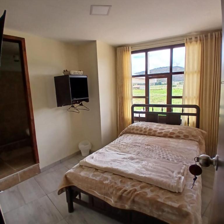 Los Geranios Hospedaje - Habitación Doble con vistas a la montaña - 1