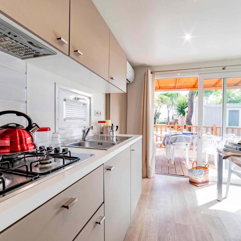 Camping Village Capo D'Orso - Bungalow Familiare - 5