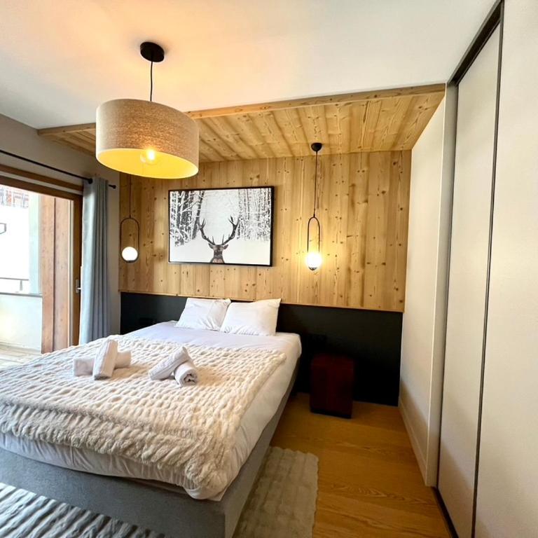 Alpe d'Huez Houses - Chez Nina - Expression - 3 chambres au pied ALPE EXPRESS - Three-Bedroom Premium Apartment with Balcony - 1