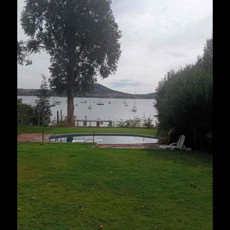 Alojamiento Punta verde Gran casa orilla Lago Rapel piscina ,jardines ,quincho ,terrazas,para 13 - Five-Bedroom House - 3