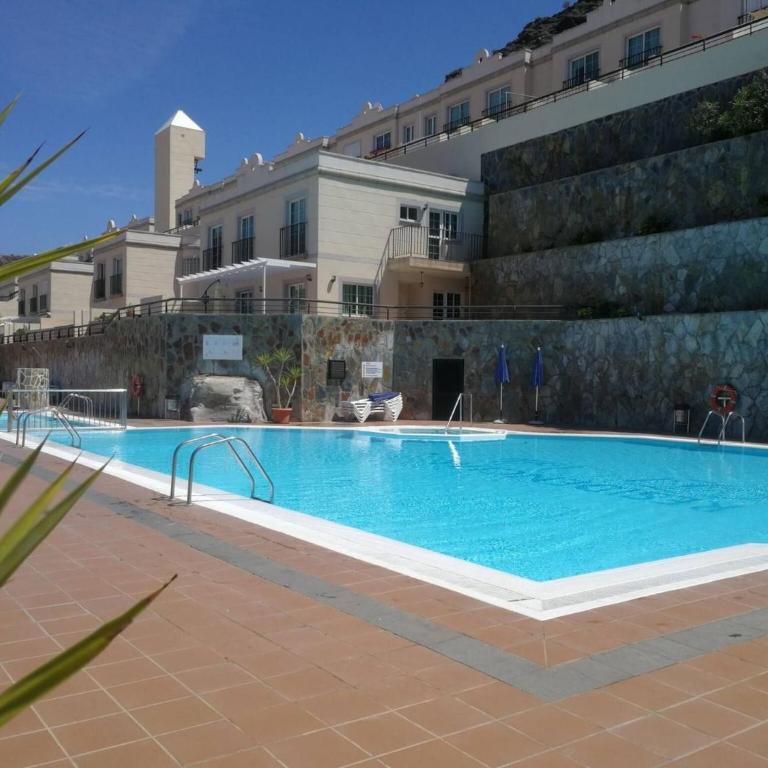 Cozy home with terrace and access to swimming pool - Apartment - 36