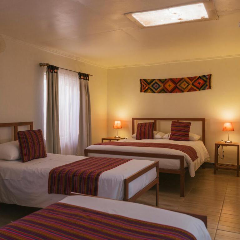 Hostal Nuevo Amanecer - Habitación Familiar - 12