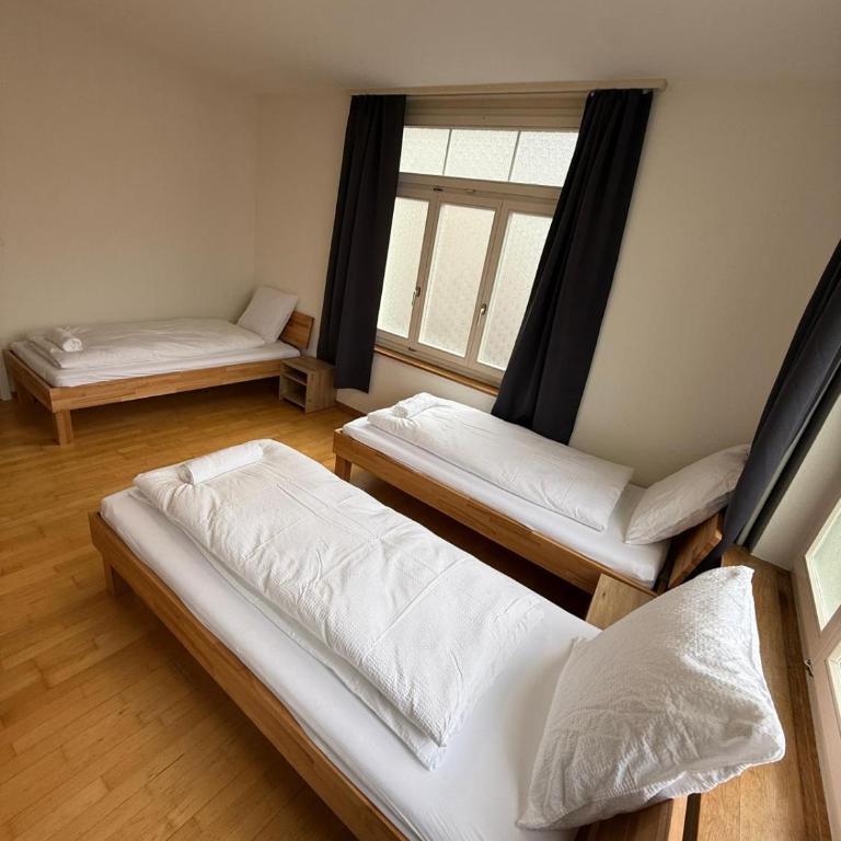 Swiss Holidays-City Apartments Interlaken - Basic Triple Room with Shared Bathroom - 1
