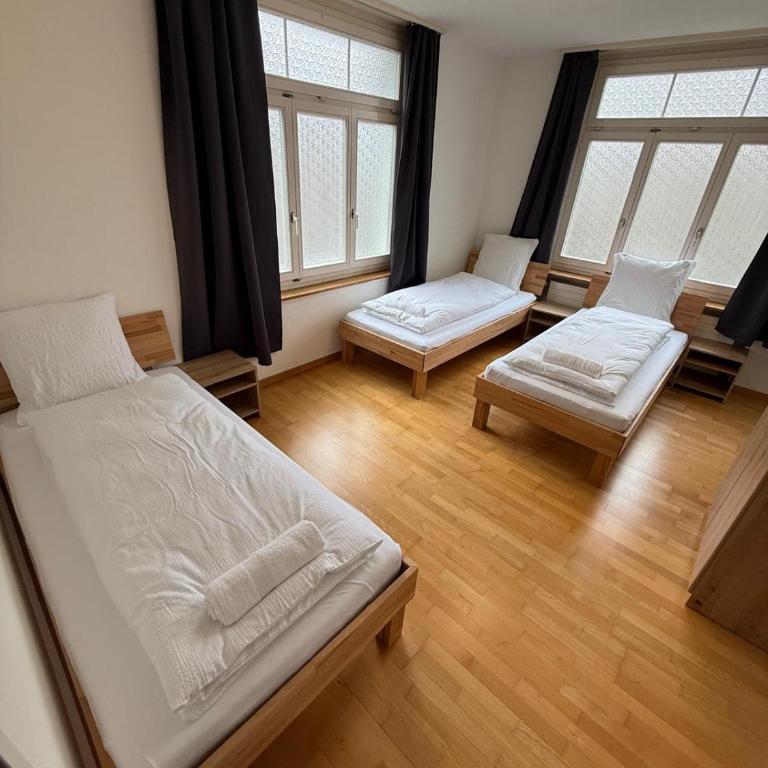 Swiss Holidays-City Apartments Interlaken - Basic Triple Room with Shared Bathroom - 2