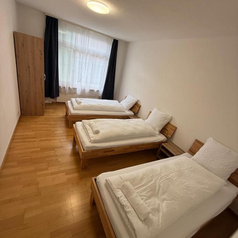 Swiss Holidays-City Apartments Interlaken - Basic Triple Room with Shared Bathroom - 1